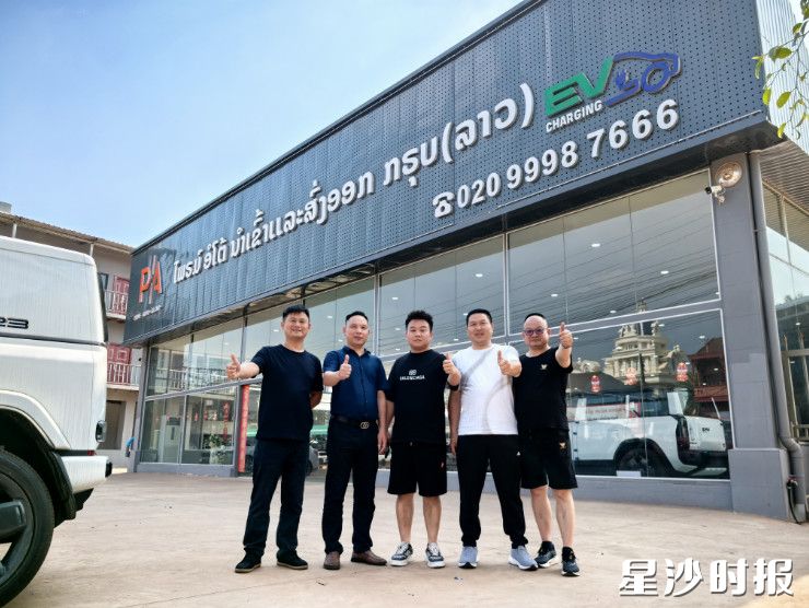 长沙县湘龙商会考察团组织精锐力量横跨中老两国三省六城，深度调研二手车出口市场。湘龙街道供图