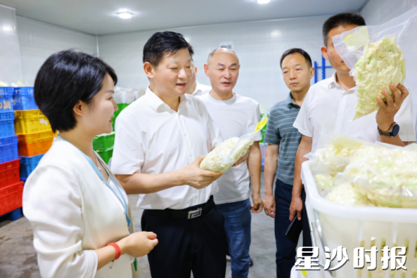 付旭明在华通汇达食品供应链基地调研。